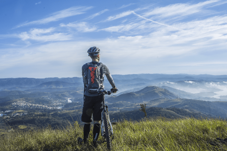 Cyclist on a mountain top