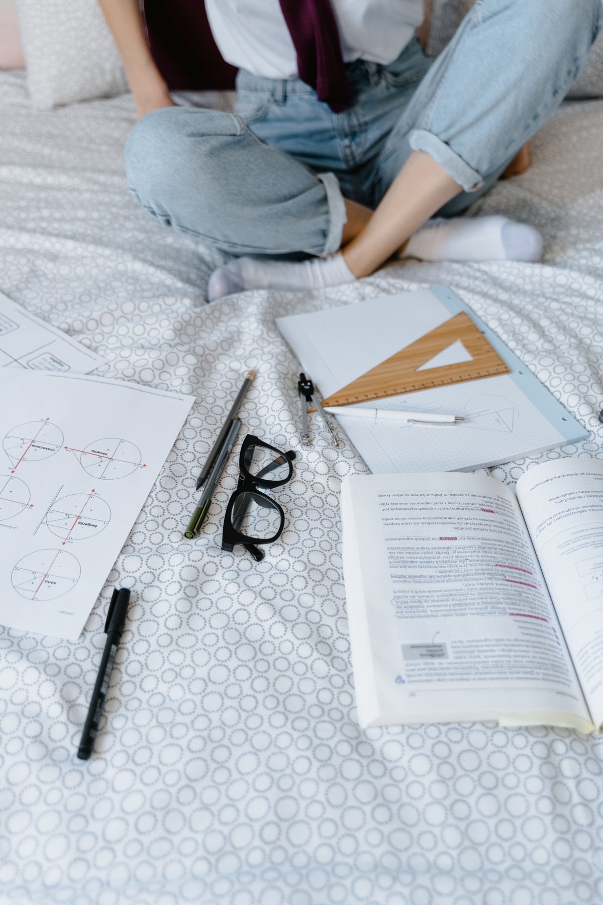 Student studying on preloved bedding