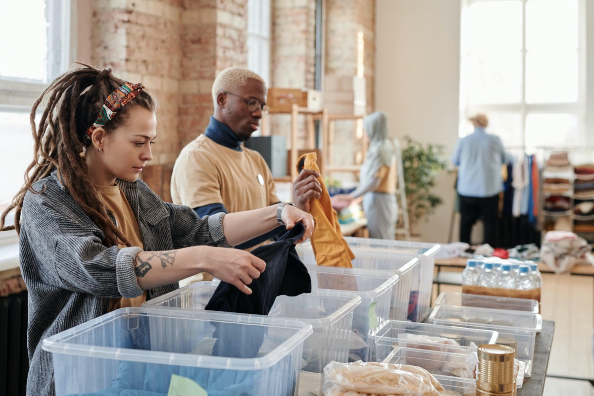People packing boxes for donation