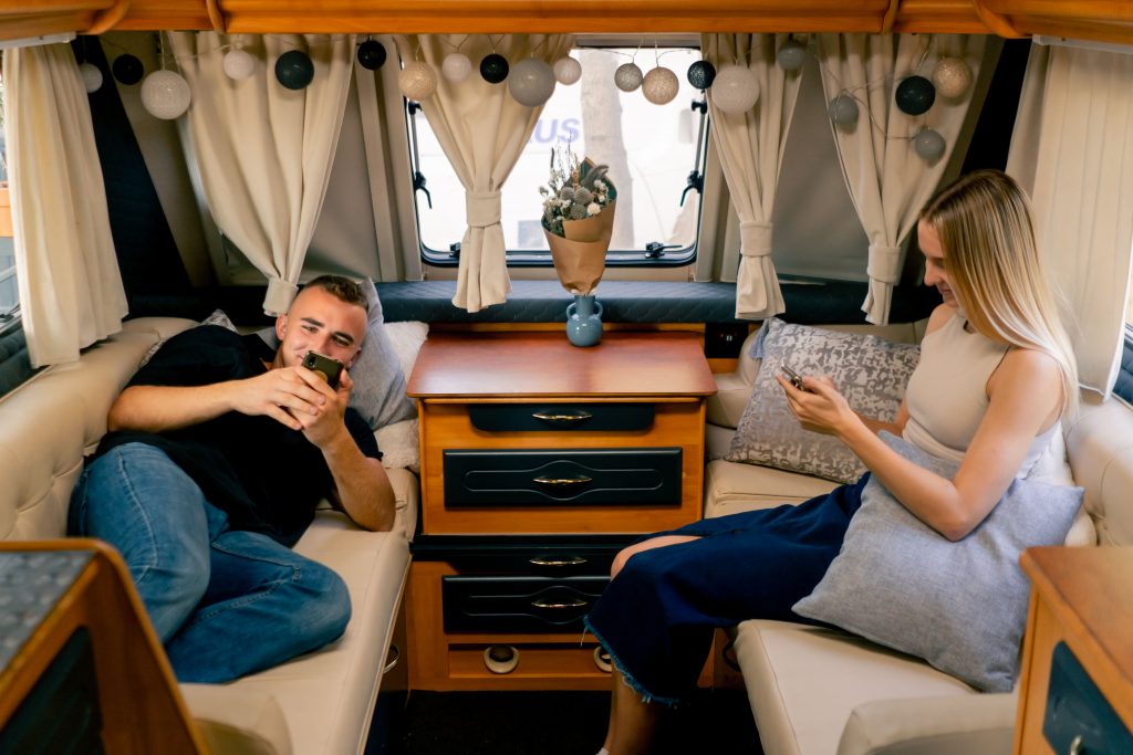 Couple relaxing in Caravan