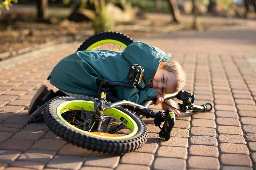 Little kid riding on a bike
