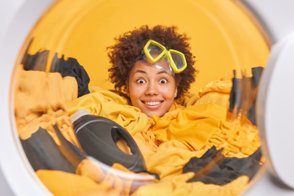 happy person with tumble dryer